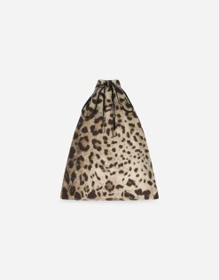 Mid-length swim trunks with leopard print
