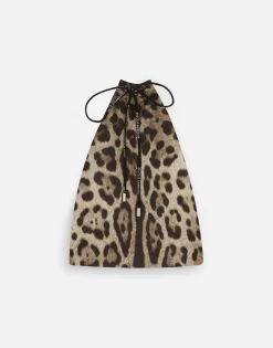 Mid-length swim trunks with leopard print