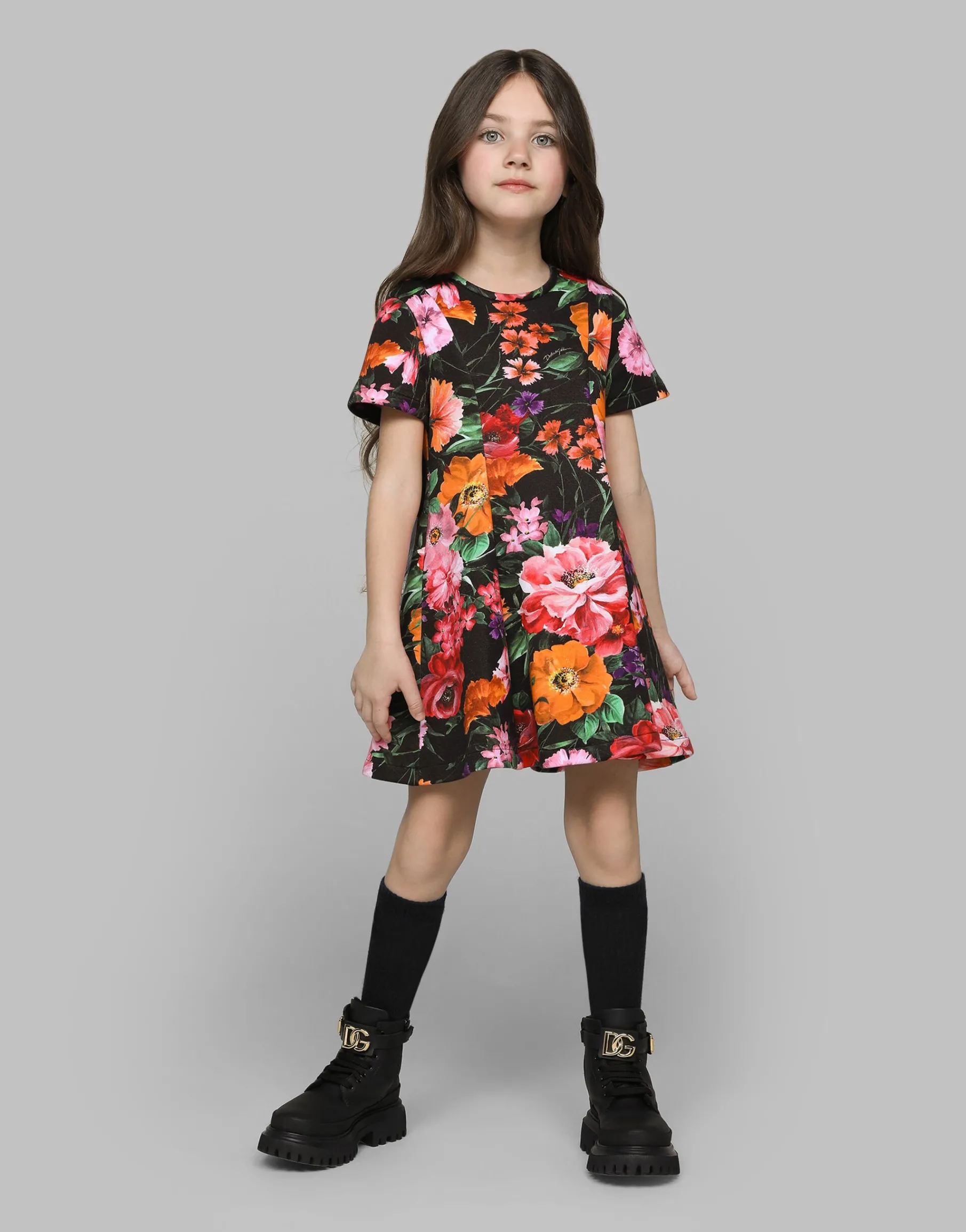 Neoprene dress with floral print over a black background