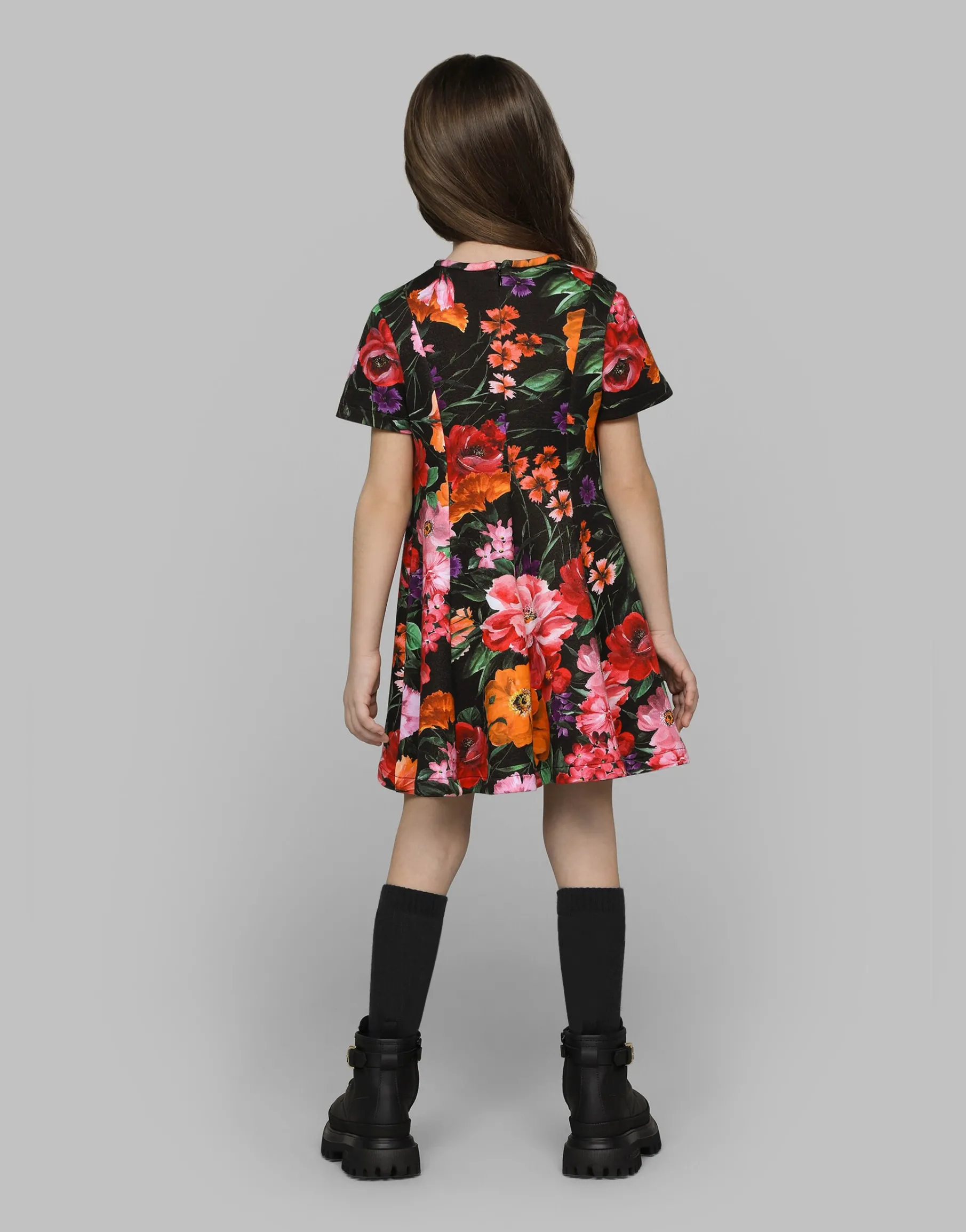 Neoprene dress with floral print over a black background