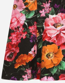 Neoprene dress with floral print over a black background