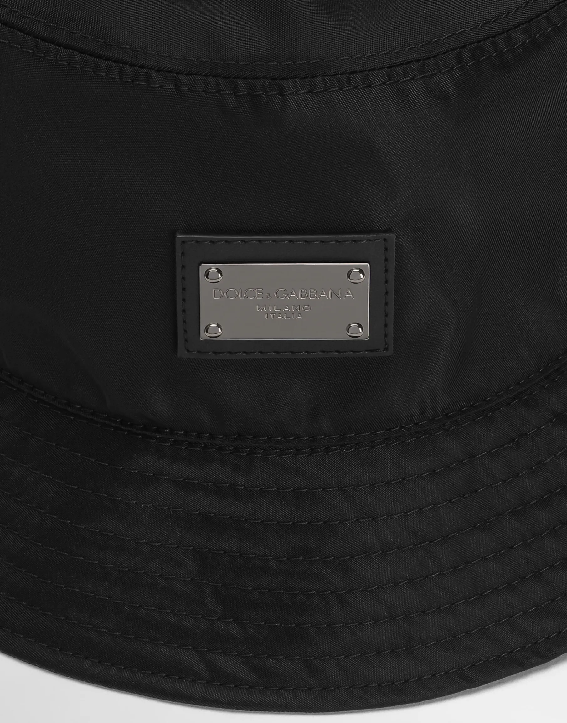 Nylon bucket hat with branded plate