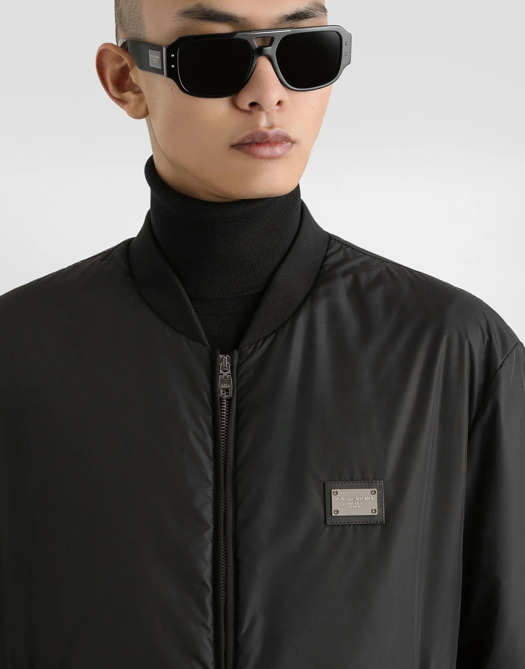 Nylon jacket with branded tag
