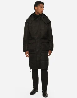 Nylon jacket with hood and branded tag