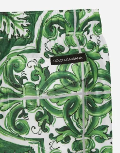 Nylon swim trunks with green majolica print