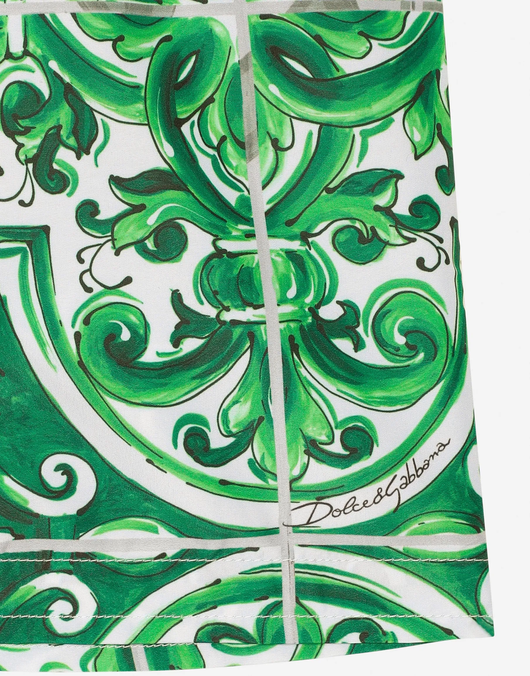Nylon swim trunks with green majolica print