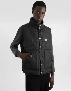 Nylon vest with branded tag