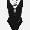 One-piece swimsuit with plunging neckline and lacing and eyelets