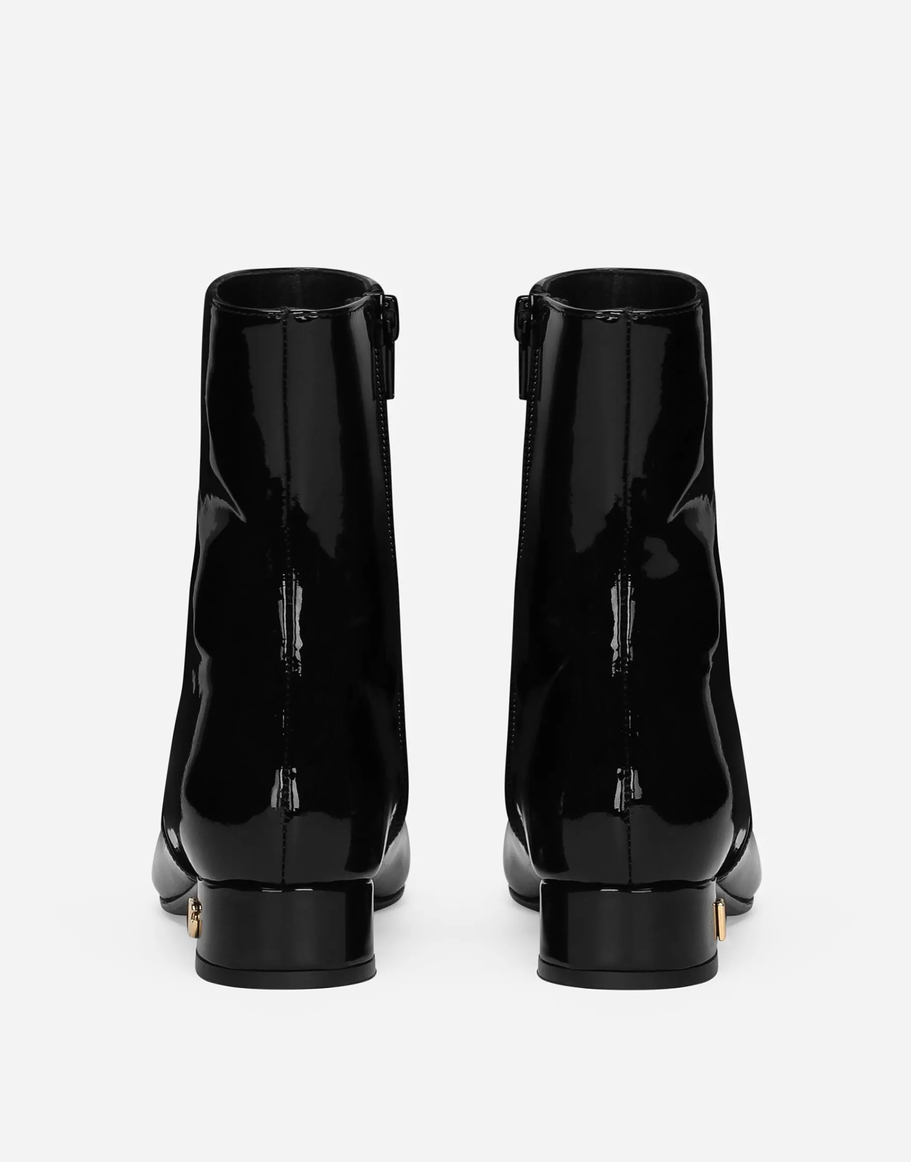 Patent leather ankle boots with branded heel