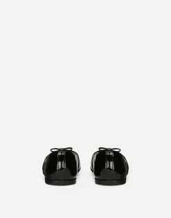 Patent leather ballet flats with bow