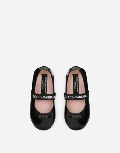 Patent leather ballet flats with bow