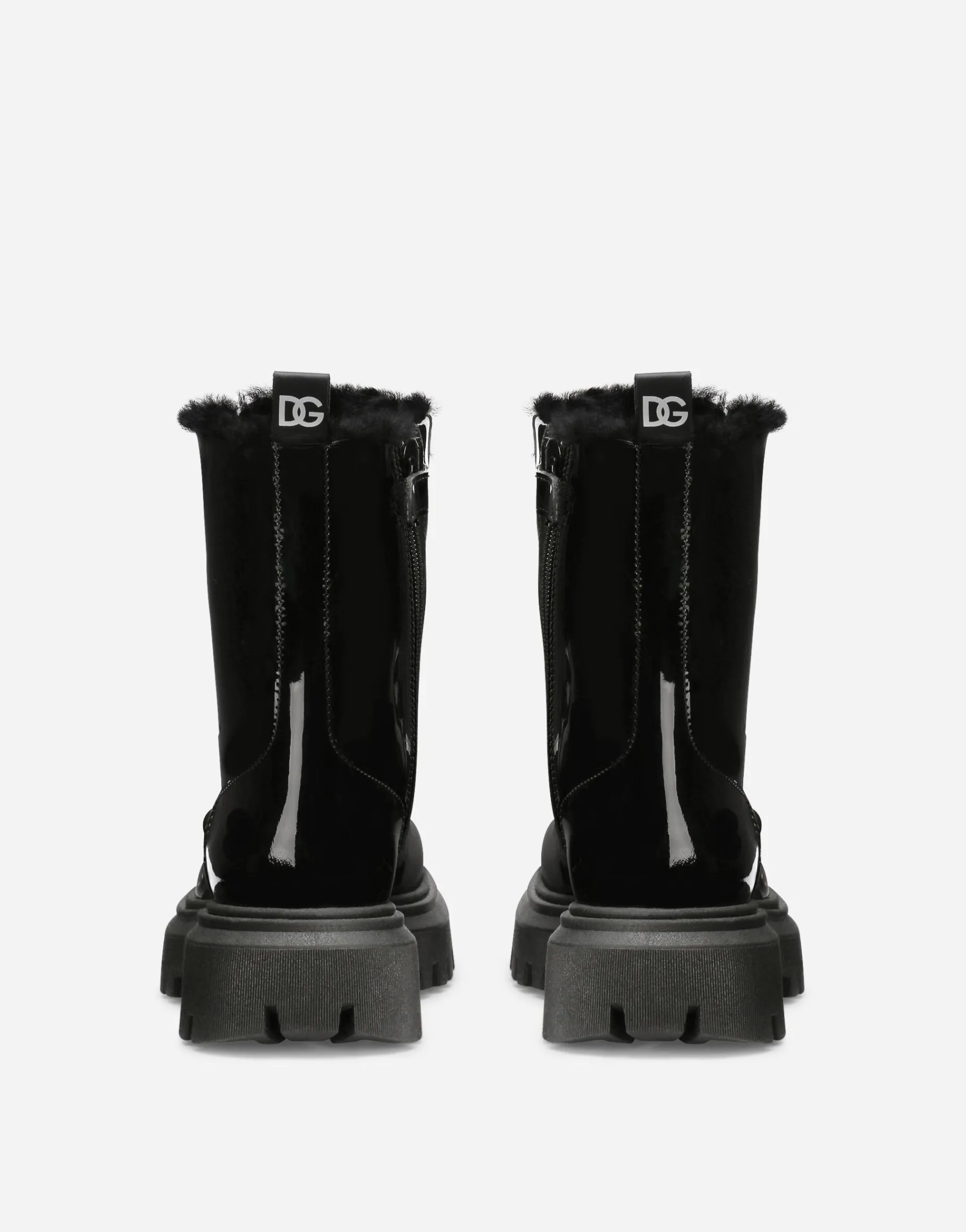 Patent leather combat boots with faux fur lining