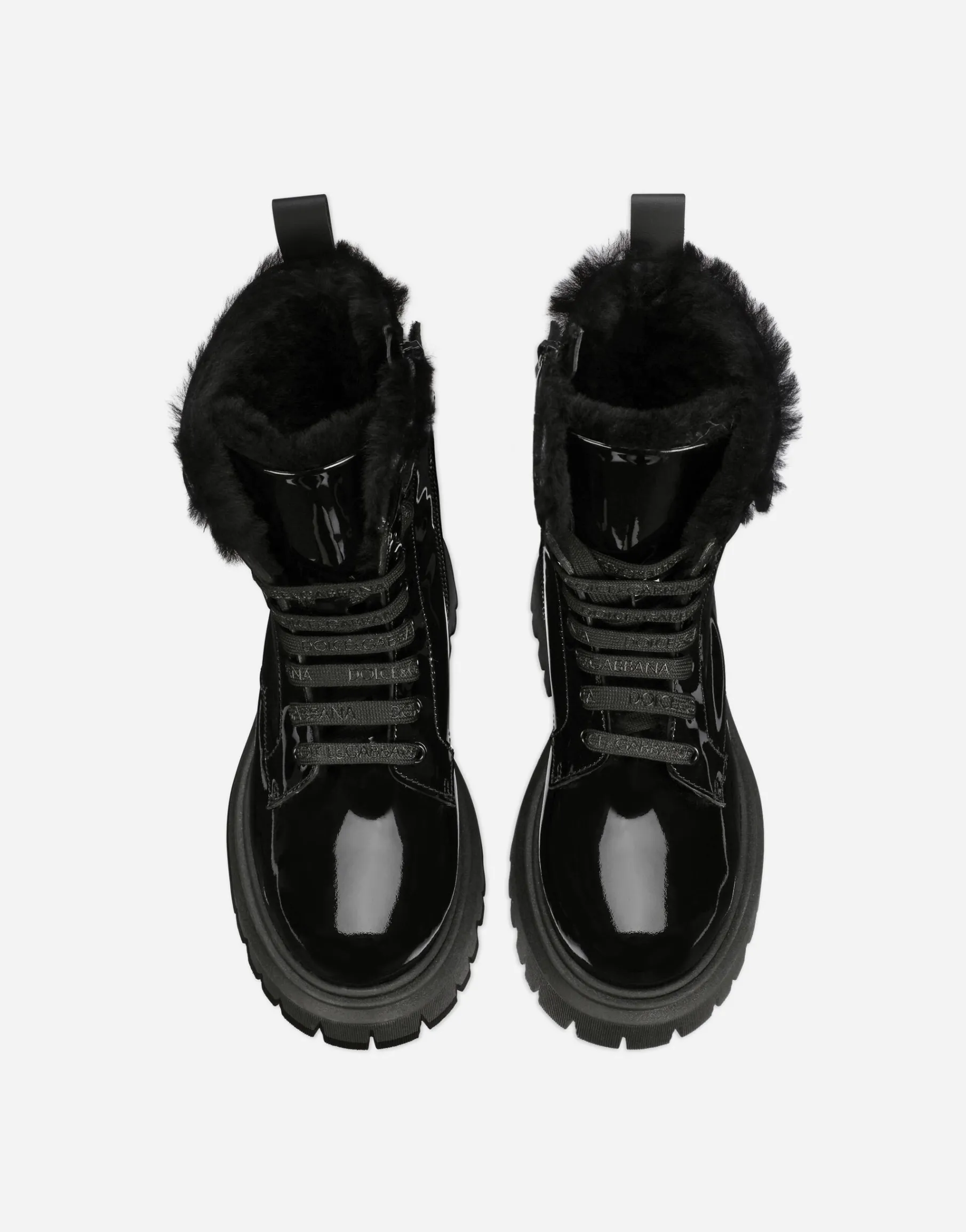 Patent leather combat boots with faux fur lining