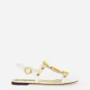 Patent leather sandals with stone embellishment
