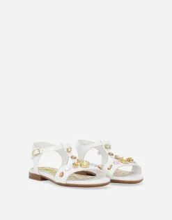 Patent leather sandals with yellow majolica print and Swarovski crystals