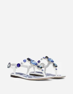 Patent leather thong sandals with embroidery