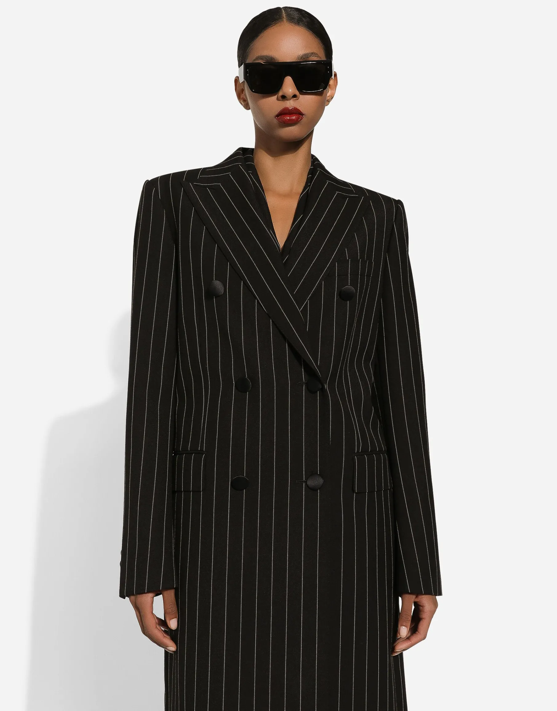 Pinstripe double-breasted coat in woolen fabric