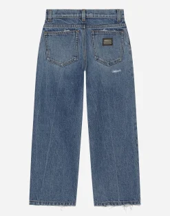 5-pocket treated denim jeans with logo tag