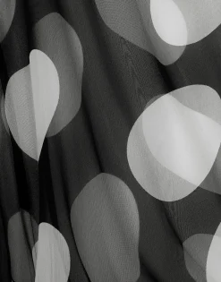 Polka-dot chiffon calf-length dress with piqué details