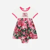 Poplin and jersey dress with rose print over a white background