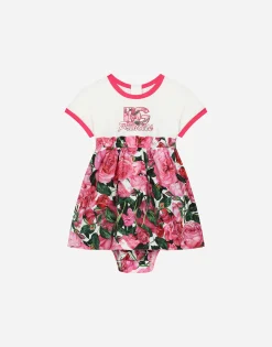 Poplin and jersey dress with rose print over a white background
