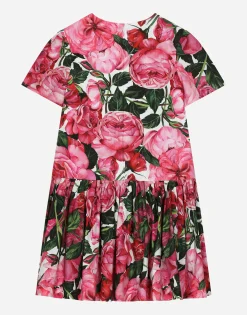 Poplin dress with rose print over a white background
