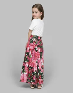Poplin dress with rose print over a white background