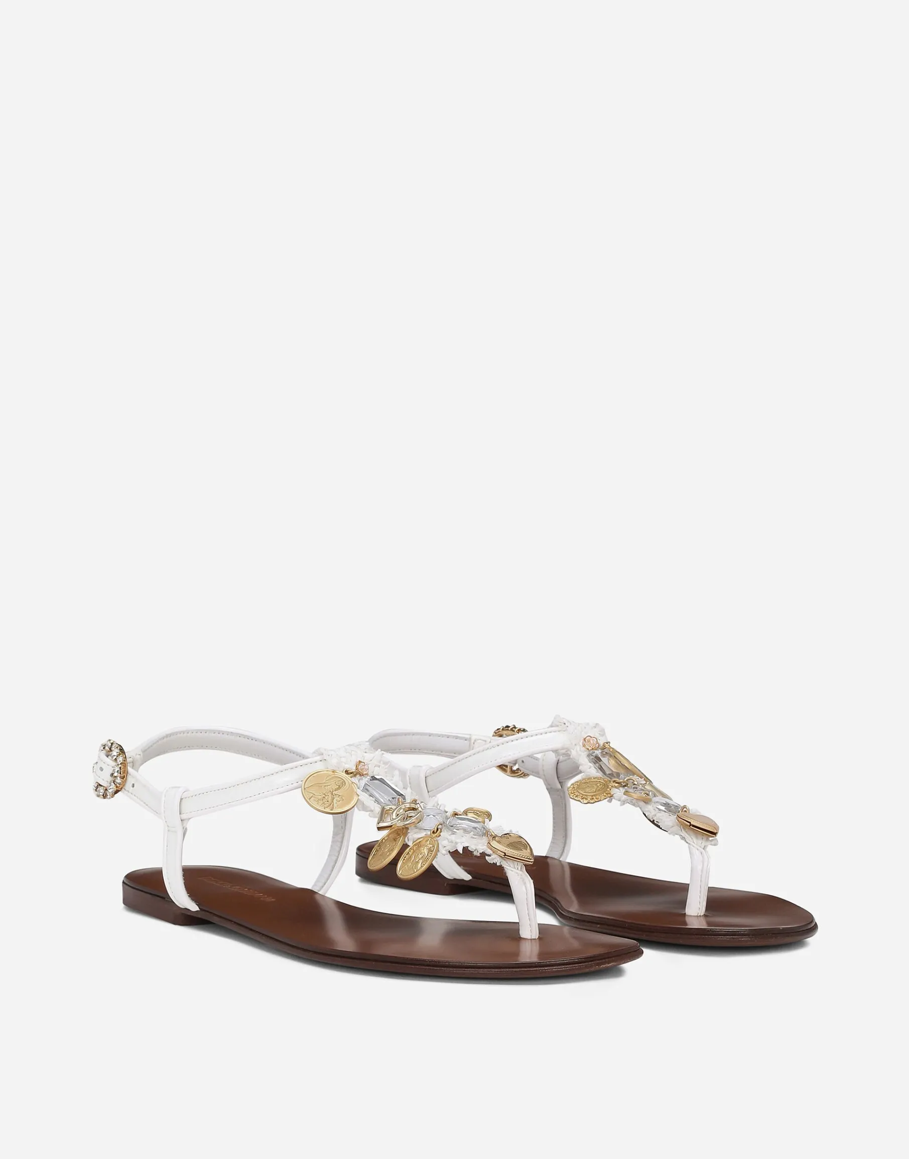 Raffia thong sandals with embroidered votive medallions