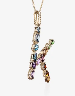 Rainbow alphabet K pendant in yellow gold with multicolor fine gems