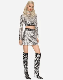 Sequined top with branded elastic