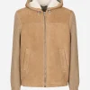 Sheepskin jacket with knit inserts and hood