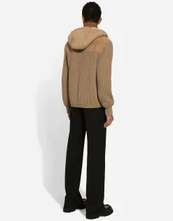 Sheepskin jacket with knit inserts and hood