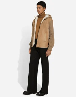 Sheepskin jacket with knit inserts and hood
