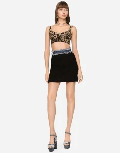 Short bustier top in charmeuse with leopard print
