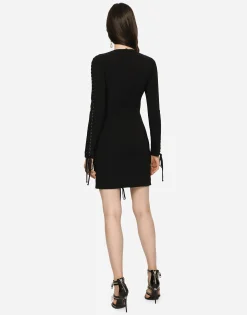 Short cady dress with laces and eyelets