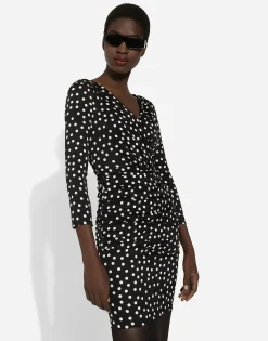 Short charmeuse dress with draped detailing and micro polka-dot print