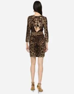 Short charmeuse dress with leopard print and tie