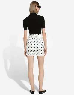 Short charmeuse skirt with polka-dot print