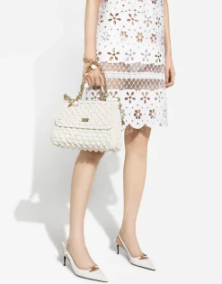 Short cotton dress with cut-out detailing