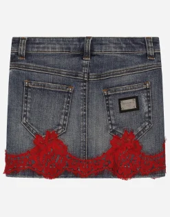 Short denim skirt with lace insert