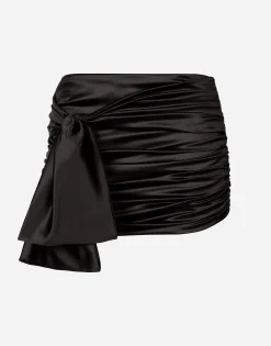 Short draped satin skirt with side bow