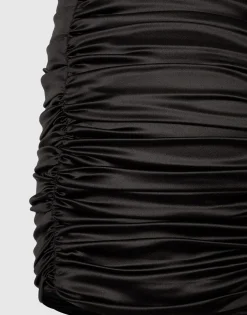 Short draped satin skirt with side bow