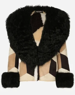 Short heavy jacket in sheepskin patchwork