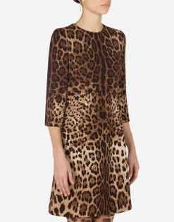 Short leopard print dress in double crêpe
