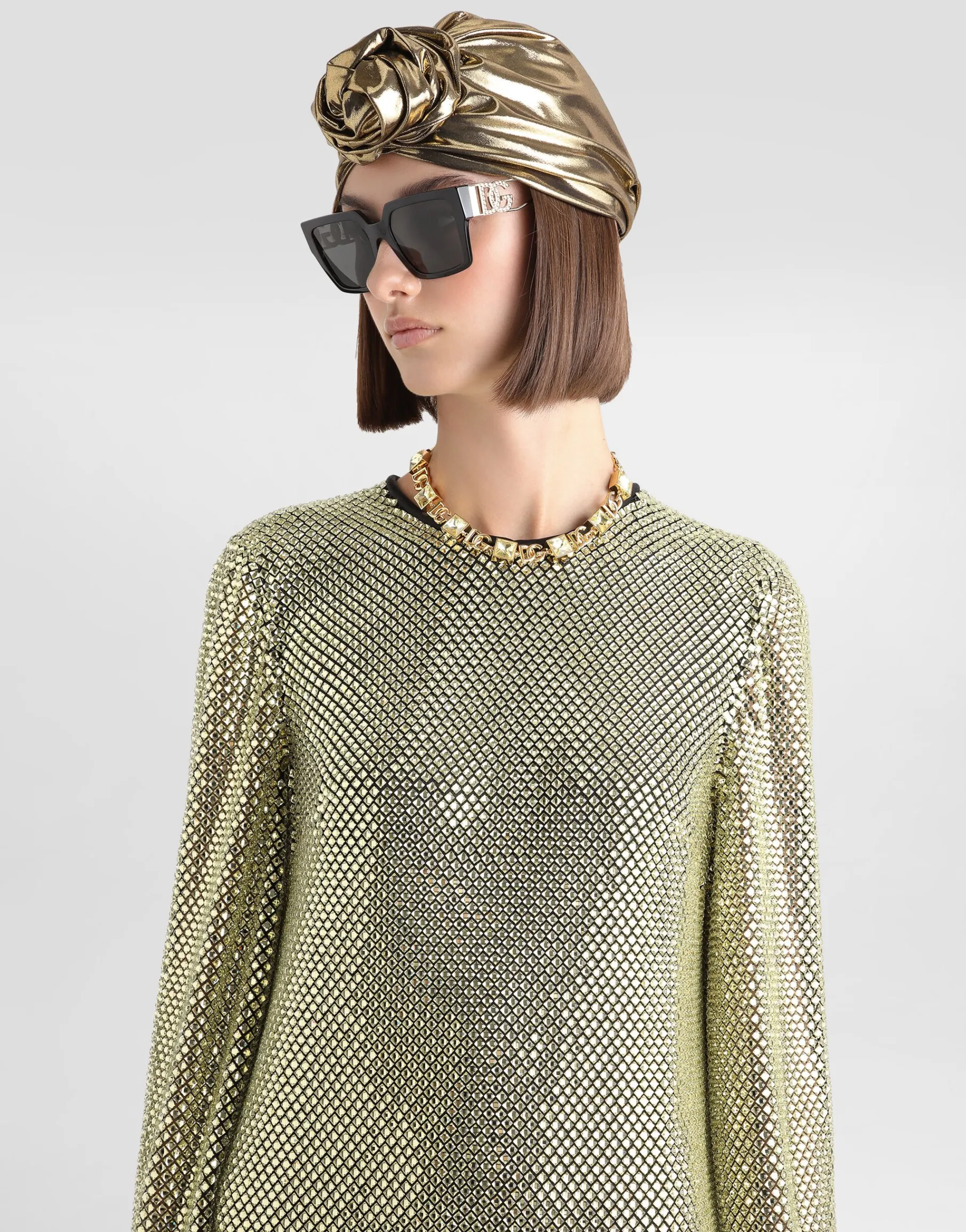 Short long-sleeved dress in crystal mesh
