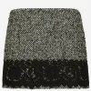 Short micro-tweed skirt with lace insert