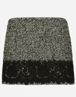 Short micro-tweed skirt with lace insert