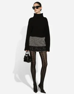 Short micro-tweed skirt with lace insert