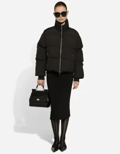 Short nylon down jacket with branded tag