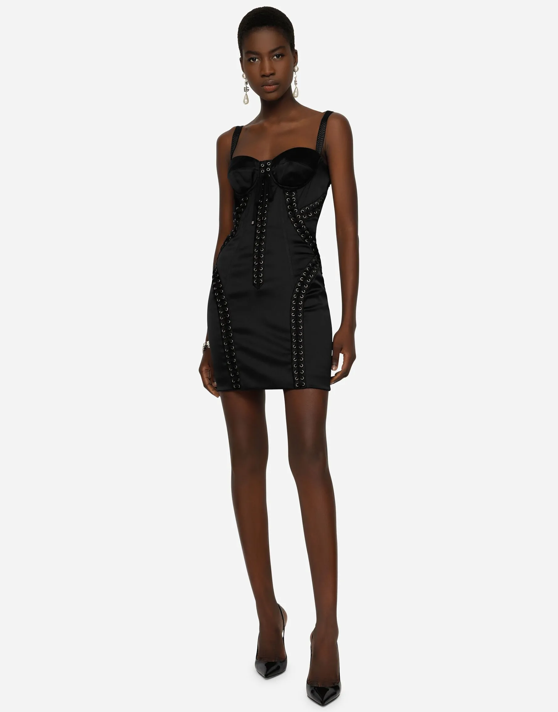 Short satin dress with laces and eyelets